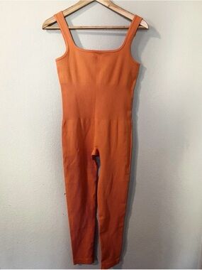 Women’s "Unbranded" Orange sleeveless jumpsuit. Size L